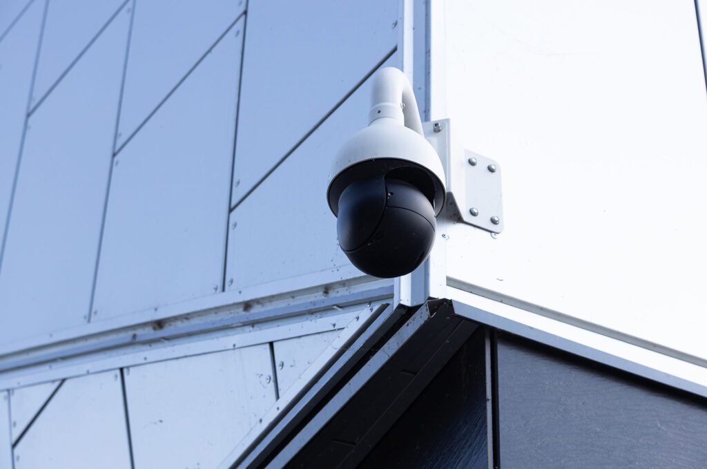 Security camera installed on the exterior of a building.