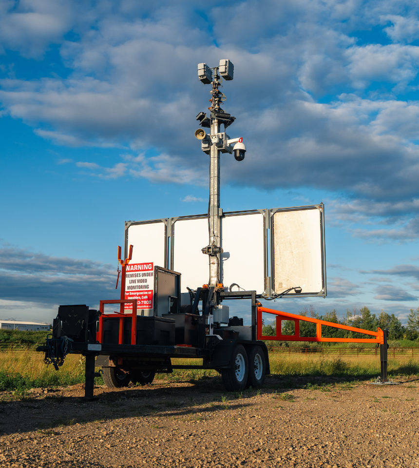 Solar-powered mobile surveillance trailer with thermal cameras, AI detection, and 360° coverage for remote site security in Alberta.